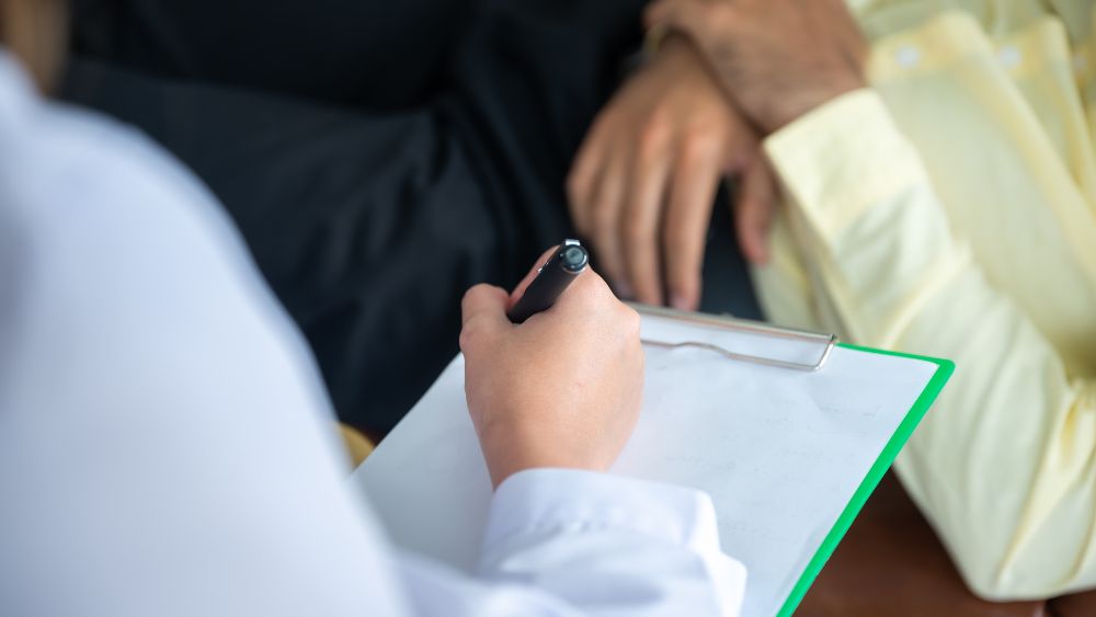 Psychiatrist%taking%notes%with%patient - Shanti Mindcare Blog